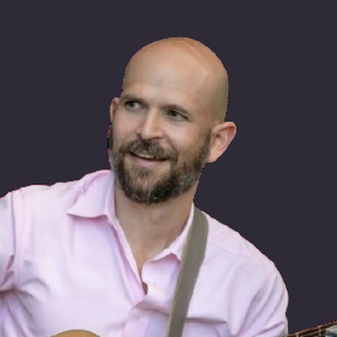 Brenton Kossak with his guitar